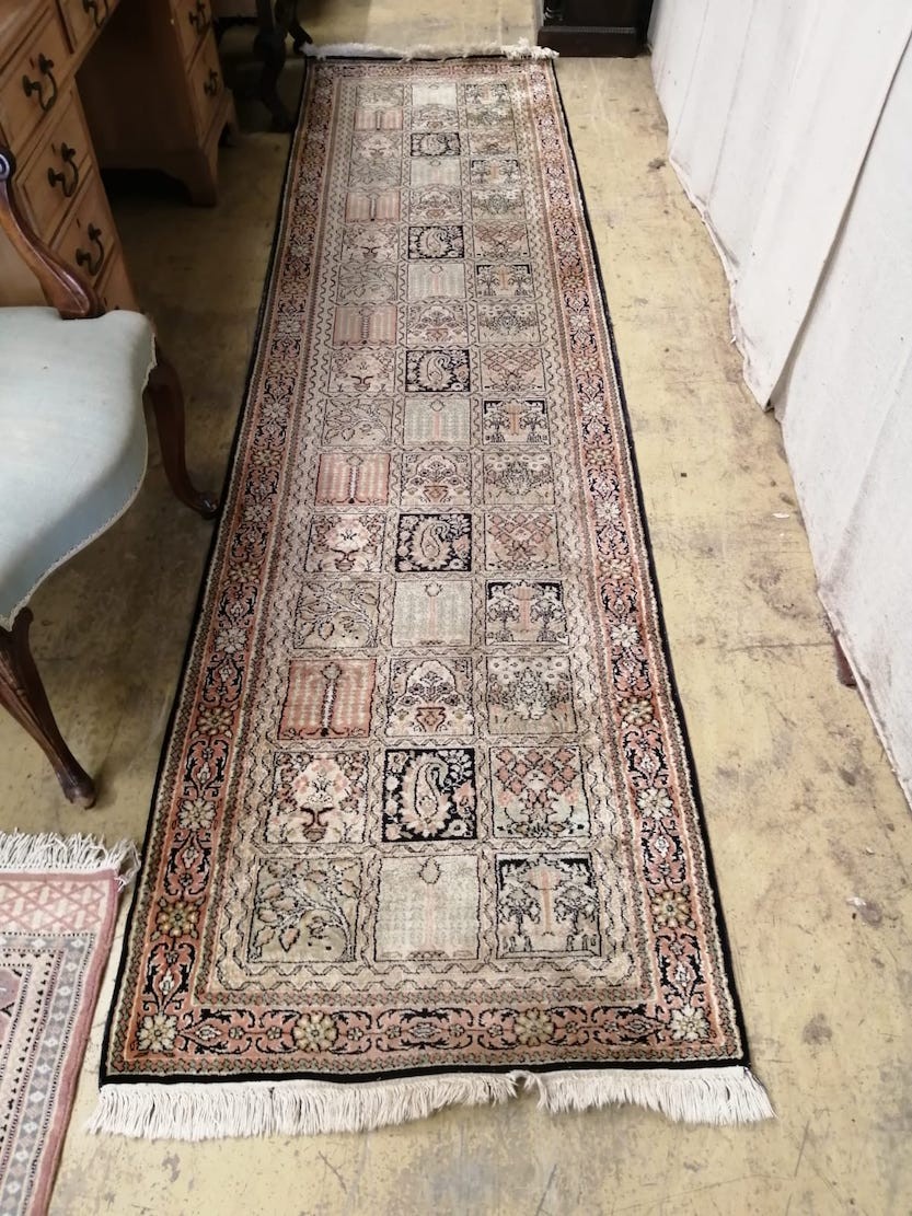 Three North West Persian design runners and rugs, largest 306 x 80cm